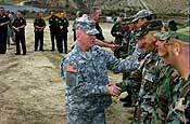  Lt. Gen. H Steven Blum, chief, National Guard Bureau, meets with citizen-soldiers and airmen and with Border Patrol agents at the U.S. border with Mexico near San Diego, Calif., on Nov. 27, 2006, during a visit to troops participating in Operation Jump Start. Up to 6,000 National Guard members are helping the Border Patrol secure the nation's southern border. U.S. Army photo by Sgt. Jim Greenhill