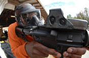 Staff Sgt. Eric Brown of the Florida National Guard's Counterdrug Training Academy practices with his weapon before competition at the 2008 SWAT Round-up International Competition in Orlando, Fla., Dec. 4, 2008. Photo by Tech. Sgt. Thomas Kielbasa.