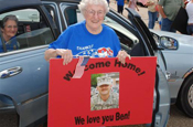 CARVILLE, La. – The 98-year-old Della S. Wallace of Jarreau, La. enthusiastically waits for the arrival of her great-grandson Staff Sgt. Ben R. Wallace of Jackson, La. Wallace is one of the 175 soldiers of the 769th Engineer Battalion out of Baton Rouge that returned home on Mon., July 14, in support of Operation Iraqi Freedom. (U.S. Army Photo by Staff Sgt. Lacy Brown, 415th Military Intelligence Battalion Unit Public Affairs Representative)
