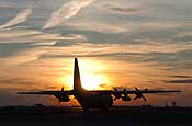 harlotte, NC. A North Carolina Air National Guard C-130 begins to depart Charlotte-Douglas International Airport on February 12, 2007. Several aircraft and personnel are deploying in support of Operation Enduring Freedom. (Photo by Tech Sgt Brian E. Christiansen, NCANG.)