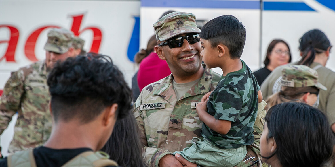 Families, friends and colleagues welcome the 734th Combat Sustainment Support Battalion home from their nearly 10-month overseas deployment at the Armed Forces Readiness Center in Kearney, Nebraska, July 19, 2022.