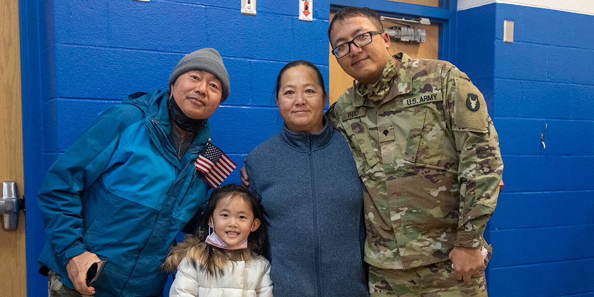 Friends and family welcome Soldiers assigned to the 1st Combined Arms Battalion, 194th Armor Regiment home near Cottage Grove, Minnesota, February 2, 2022 after a nine month deployment overseas.
