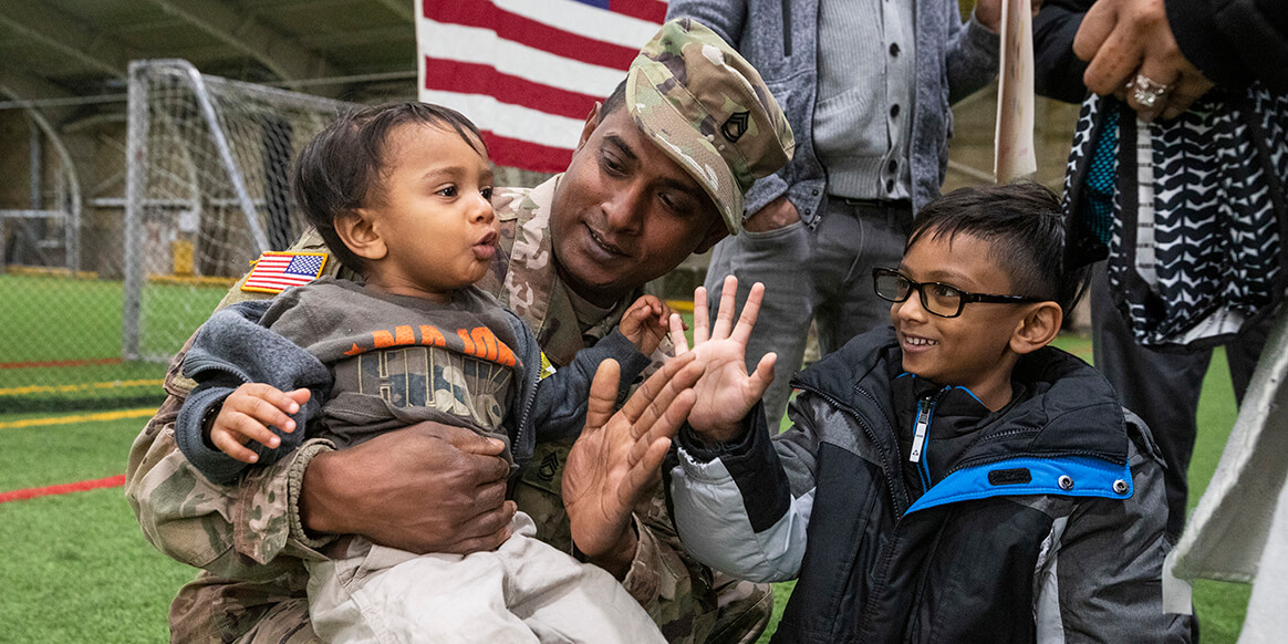 U.S. Army Sgt. 1st Class Vihal Patel, Alpha Company, 104th Brigade Engineer Battalion, New Jersey Army National Guard, is reunited with his family after the Battalion’s welcome home ceremony at the National Guard Armory at West Orange, N.J., Dec. 13, 2019.