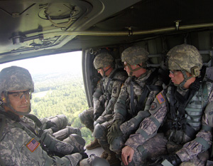 Competitors mounting the UH-60 Blackhawk