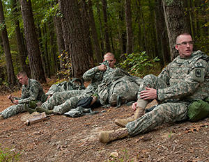 Spc. Ryan Montgomery, right, an infantryman with the Arkansas National Guard’s 39th Infantry Brigade Combat Team, takes a break before the next event of the 2014 Department of the Army Best Warrior Competition, Oct. 7, 2014 at Fort Lee, Va. Montgomery represented the Army National Guard as its top enlisted Soldier of the year. (Army National Guard photo by Staff Sgt. Darron Salzer, National Guard Bureau)(Released)