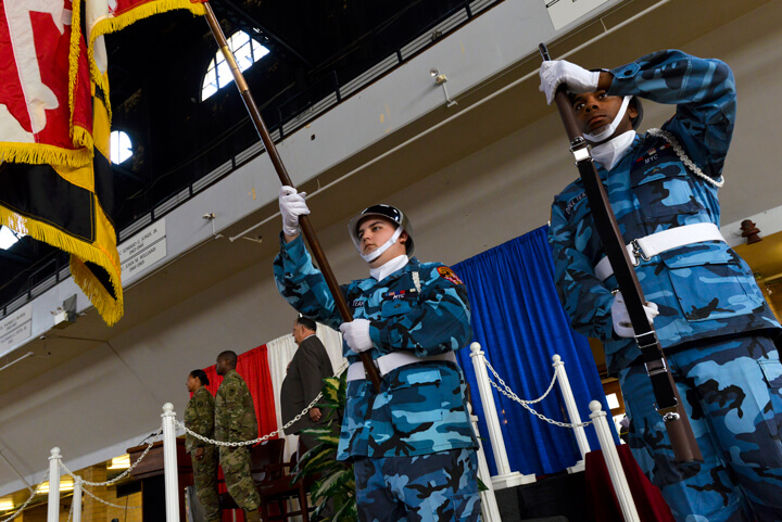 Christopher Ramirez, left, and D'wight Lucas, both members of the Freestate Academy’s cadet honor guard, take part in honor guard duties during their class’s graduation ceremony. The distinctive uniforms denote honor guard membership, which also gives cadets another leadership opportunity at the academy.