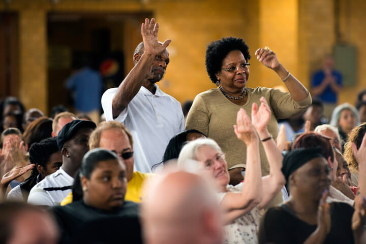 The parents of D'wight Lucas, an academy cadet, stand to be recognized during graduation ceremonies. D'wight was one of two cadets during the ceremony to make commencement speeches, sharing with those in attendance his personal story of what lead him to Freestate, how the academy has changed him and his plans for the future.