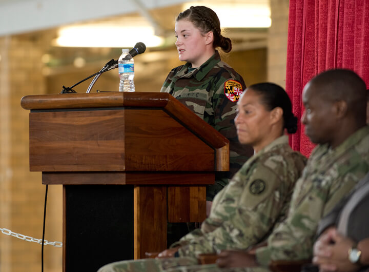 Alexis Head, a cadet at the Freestate Academy, gives a commencement speech as part of the ceremony. Alexis, along with fellow cadet D’Wight Lucas, shared her personal story of triumph and success with the packed crowd of family, peers and mentors.