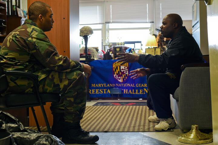 1st Sgt. Job Stringfellow talks with Cadet Jordan Wisdom