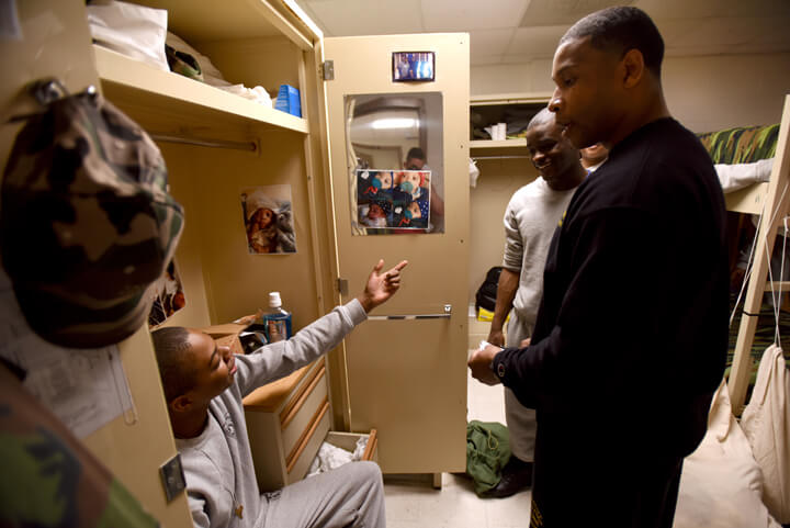 Sgt. Patrick Falls steps in to settle a dispute between cadets