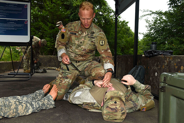 Friedlein treats a simulated casualty during the Army Warrior Tasks portion of the competition. For Friedlin, this sort of competition was nothing new. He was part of the team that won the 2016 Lt. Gen. David E. Grange Jr. Best Ranger Competition – the first Army Guard team to win Best Ranger.