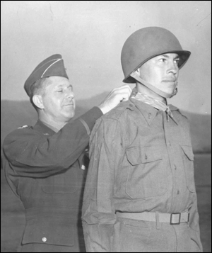 First Lieutenant Ernest Childers receives his Medal of Honor from Lieutenant General Jacobs L. Devers, at a special awards ceremony in Naples, Italy. First Lieutenant Ernest Childers receives his Medal of Honor from Lieutenant General Jacobs L. Devers, at a special awards ceremony in Naples, Italy.