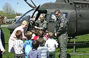 Chief Warrant Officer 4 Anne Sprute and former National Guard Bureau Counter-Drug Chief Col. Earl Bell visit students at the Mother Seton School in Emmitsburg, Md. in April 2005.