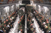 Members of the 148th Fighter, Minnesota Air National Guard, await departure in a C-17 Globemaster prior to departing to Hickam AFB, Hawaii on the morning of Nov. 9, 2007, at the Air National Guard Base located in Duluth, Minn.