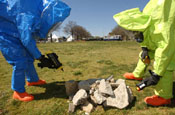 SFC Wiseman and SGT Mutter use a suite of high technology chemical and radiological detectors to determine if bomb debris is contaminated. Soldiers with the Virginia National Guard's 34th Civil Support Team test the environment for nuclear, biological and chemical agents during the Vital Guardian Exercise at the District of Columbia National Guard Armory on April 4. April 7, 2006 (by Staff Sgt. Jon Soucy)