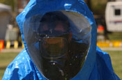  SGT Copeland of the 34th CST is operating in a level a fully encapsulated suit to limit contamination and exposure to potential hazards. Soldiers with the Virginia National Guard's 34th Civil Support Team test the environment for nuclear, biological and chemical agents during the Vital Guardian Exercise at the District of Columbia National Guard Armory on April 4. April 7, 2006 (by Staff Sgt. Jon Soucy)