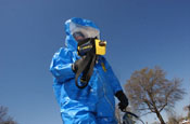 SGT Cerek of the 34th CST utilizing an APD 2000 to screen the attack site for chemical warfare agents. Soldiers with the Virginia National Guard's 34th Civil Support Team test the environment for nuclear, biological and chemical agents during the Vital Guardian Exercise at the District of Columbia National Guard Armory on April 4. April 7, 2006 (by Staff Sgt. Jon Soucy)