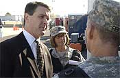  Lt. Col. Steven Ferrell, Commander of the 102nd Civil Support Team, (right), briefs Pat Egan, Chief of Staff for Governor Theodore R. Kulongoski (left), following the CST demonstration event at the Marion County Regional Fire Training Facility in Brooks, Ore., on Oct. 27, 2006.