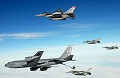  F-16 Fighting Falcons from the North Dakota Air National Guard's 119th Fighter Wing get refueled by a 319th Air Refueling Wing KC-135 Stratotanker Jan. 16 over North Dakota. (U.S. Air Force photo/David H. Lipp)