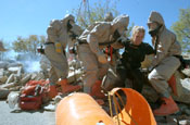 CERF-P team members extract a survivor from a simulated weapon of mass destruction attack.