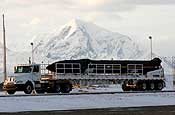 A Ground Based Interceptor (GBI) is transported to its silo during a recent emplacement on the Missile Defense Complex (MDC) at Fort Greely, Alaska. Ft Greely is home to more than a dozen GBIs ready to defend the United States and its allies from an accidental or intentional inter-continental ballistic missile launch. (Photo by SGT Jack Carlson III)