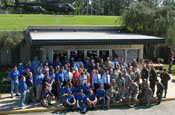 Chertoff and Paulison pose with FEMA and Guard personnel at the Federal Regional Center in GA
