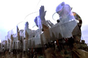 Soldiers of the National Guard Reaction Force (NGRF) square off against rioting demonstrators during the Vital Guardian Exercise at the District of Columbia National Guard Armory on April 4.