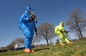 Soldiers with the Virginia National Guard's 34th Civil Support Team test the environment for nuclear, biological and chemical agents during the Vital Guardian Exercise at the District of Columbia National Guard Armory on April 4. April 7, 2006 (by Staff Sgt. Jon Soucy)