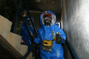 Members of the Utah National Guard's 85th Weapons of Mass Destruction Civil Support Team employ hazardous material detection equipment at a mock disaster site in Ogden, Utah, during Operation Vigilant Guard. (Photo by SPC Chris Gardner, Utah National Guard)