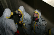 Members of the Colorado National Guard's CERFP team respond at a mock disaster site in Ogden, Utah, during Operation Vigilant Guard. (Photo by SPC Chris Gardner, Utah National Guard)