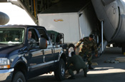 Members of the Colorado National Guard's CERFP team unload their equipment after arriving at Salt Lake Air Base in support of Operation Vigilant Guard, a multiagency earthquake-response exercise hosted Aug. 29-31 by the Utah National Guard. (Photo by SPC Chris Gardner, Utah National Guard)