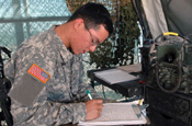 A West Virginia Air National Guard member, not identified for security reasons, helps set up a medical clinic in the abandoned company town of Playas in isolated southwest New Mexico. The clinic will be used to treat personnel participating in Operation Jump Start, the National Guard's support to the Customs and Border Patrol. (Photo by Sgt. Jim Greenhill, National Guard Bureau)
