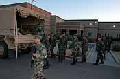  U.S. Army Soldiers from 2nd Battalion, 200th Infantry Regiment, New Mexico National Guard load into the back of a truck to begin border-security operations near Deming, N.M., June 18, 2006. (U.S. Army photo by Sgt. Jim Greenhill)