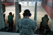 A California National Guard Soldier assigned as a range safety officer for the U.S. Border Patrol at the San Diego Sector Small Firearms Range monitors weapons qualification in July. The Citizen-Soldier is not identified because of security reasons. The National Guard is supporting the Border Patrol during Operation Jump Start. (Photo by Sgt. Jim Greenhill, National Guard Bureau)