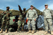 U.S.- Mexican Border, Southwestern Arizona. Brigadier General Matthew Whittington, the Arizona National Guard Operation Jump Start commander, meets with soldiers assigned to the 1-252 Combined Arms Battalion, North Carolina Army National Guard, who are continuously standing by and observing an area of the border. The unit is currently deployed here for thier annuall training observing the border, and are working with U.S. Border Patrol in support of Operation Jump Start. Photo by Tech Sgt Brian E. Christiansen, North Carolina Air National Guard
