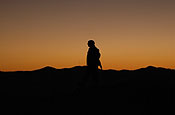 Sasabe, AZ - A member of the N.C. Army National Guard, Task Force Scorpion in support of Operation Jump Start is watching the Mexican/US border at Sunset. (NC Army National Guard Photo by Spec. Jessica L. Sheldon)