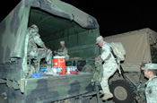 National Guard Soldiers in the 2nd Battalion, 200th Infantry, New Mexico National Guard, load up before dawn to relieve colleagues helping the Border Patrol secure the border with Mexico south of Deming, N.M. (Photo by Sgt. Jim Greenhill, National Guard Bureau)
