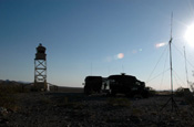 A National Guard entry identification team at an observation post on Radar Hill in southern New Mexico assists Border Patrol agents by gathering intelligence about possible undocumented aliens entering the United States from Mexico. The skybox contains equipment that enhances Soldiers' ability to see by day or night. (Photo by Sgt. Jim Greenhill, National Guard Bureau)