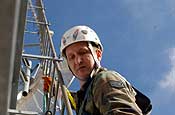 An Oregon Air National Guard member, of Gresham, Ore., from the 142nd Fighter Wing Communications Flight, Portland Air National Guard Base, scales a communications tower near Tucson, Ariz. on Jan. 18 to conduct an inspection of the tower. The Guardsman is deployed to Arizona in support of Operation Jump Start and is assigned to the Repeater Team in Tucson, Ariz. which is supporting U.S. Customs and Border Patrol in upgrading their communications system. The inspection survey is part of this upgrade. (U.S. Air Force photo by Senior Airman Trish Harris, 142nd Fighter Wing - Visual Information)