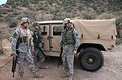 Three Tennessee Army National Guard Soldiers, who are not being identified for security reasons, keep an eye out for signs of illegal activity along the U.S. border with Mexico in the U.S. Border Patrol's Sasabe District in Arizona Friday, Jan. 19, 2007. The Soldiers were recently involved in an incident along the border where members of their Entry Identification Team were approached by armed individuals near the border. After moving to a safer location to observe the individuals it was radioed to agents from the U.S. Border Patrol. (U.S. Army photo by Sgt. 1st Class Gordon Hyde)