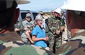 (ALONG THE U.S.-MEXICO BORDER, SOUTH OF YUMA, Az.) Aug. 4, 2006 Kansas Gov. Kathleen Sebelius addresses the Airmen of the 184th Civil Engineering Squadron of the Kansas Air National Guard. The 184th is working on building a fence along the U.S. Mexico border in southern Arizona. The mission is part of Operation Jump Start, in which the National Guard is working with the U.S. Border Patrol to bolster security along the nation's southern border. (U.S. Air Force photo by Staff Sgt. Dan Heaton.)