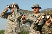 Members of the North Carolina Army National Guard, observe the border with Mexico in San Luis, Ariz., as part of their duties with the U.S. Border Patrol. (Photo by Tech. Sgt. Brian Christiansen)