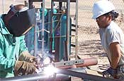 ational Guard Soldiers, from the Guam Army National Guard, build a fence for the U.S. - Mexico border near San Luis, Ariz. (By Air Force Staff Sgt. Dan Heaton)