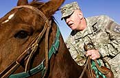  Lt. Gen. H Steven Blum, chief, National Guard Bureau, rides a Border Patrol horse during a visit to the U.S. border with Mexico near Columbus, N.M., on Nov. 29, 2006. Up to 6,000 National Guard troops are helping the Border Patrol secure the nation's southern border in Operation Jump Start. U.S. Army photo by Sgt. Jim Greenhill