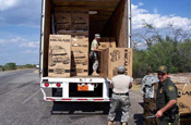 National Guardsman assisted Border Patrol Agents at the Freer Border Patrol checkpoint with the removal of 2000 pounds of marijuana from a hidden compartment in a semi-trailer.