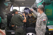 NG assisting Border Patrol with a narcotics seizure at the Kingsville, TX checkpoint in RGV.
