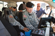 Army Maj. Gen. Peter M. Aylward, special assistant to the chief of the National Guard Bureau, right, learns about the equipment used by California National Guard members at inland and coastal sites in southern California to support U.S. Customs and Border Protection and U.S. Immigration and Customs Enforcement. Aylward visited National Guard troops along the U.S.-Mexico border in all four border states last week. (Photo by Army Staff Sgt. Jessica Inigo, California National Guard) 