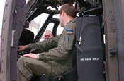 Army Col. Sean Casey, chief of staff of the Maryland National Guard, looks on as an Estonian air force pilot goes over the flight instruments of a UH-60 Black hawk helicopter at the Army Aviation Support Facility in Edgewood, Md., June 18, 2012. Two pilots with the Estonian air force have been training with the Maryland Army National Guard's C Company, 1st Battalion, 169th Aviation Regiment as part of the State Partnership Program, which pairs up National Guard units with partner nations worldwide.