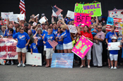 CARVILLE, La. – Family members of Soldiers from the 769th Engineer Battalion out of Baton Rouge anxiously await the arrival of their loved ones at the Baton Rouge Metropolitan Airport on Mon., July 14. (U.S. Army Photo by Staff Sgt. Lacy Brown, 415th Military Intelligence Battalion Unit Public Affairs Representative)