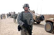 KANDAHAR, Afghanistan - Army Sgt. 1st Class Curtis Stull, with the 207th Infantry Brigade, Alaska National Guard, pulls security during a convoy conducted by 207th commander and Civil Affairs team in an effort to monitor activity in Kandahar city. (Photo by Army Sgt. Mayra Kennedy) 